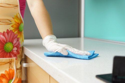 Professional office cleaners in SW19 cleaning a modern workspace