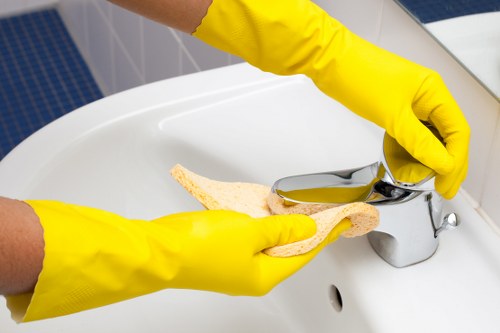 Local cleaners preparing a kitchen in SW19 for a deep clean