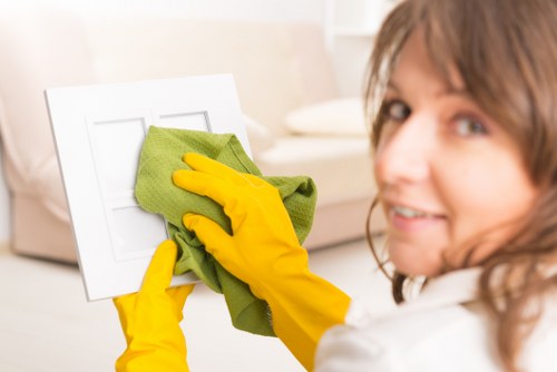 Cleaning staff reviewing hazards and using safe procedures around products and equipment.